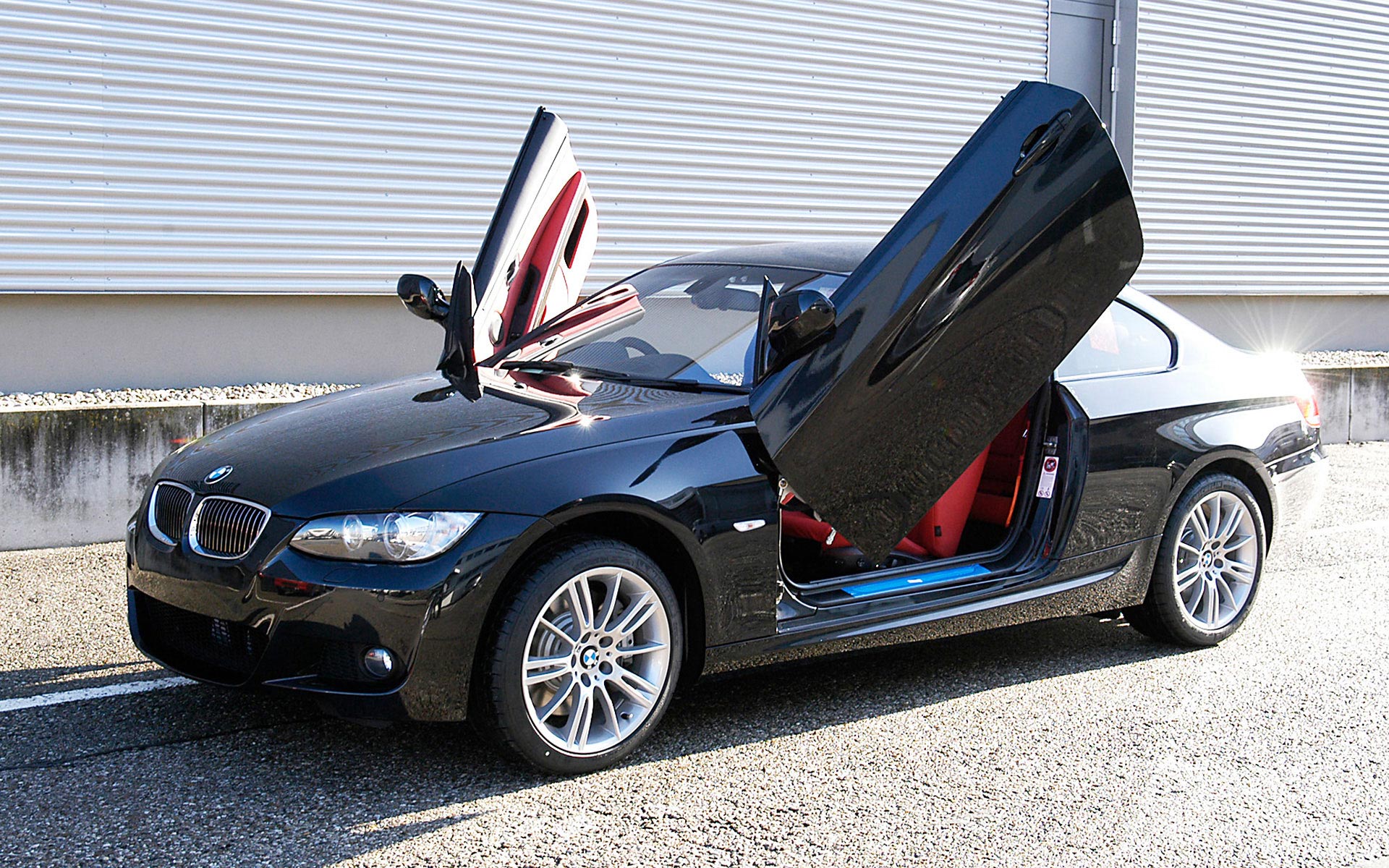 A customised BMW 335i with M Sport Package and gull wing doors