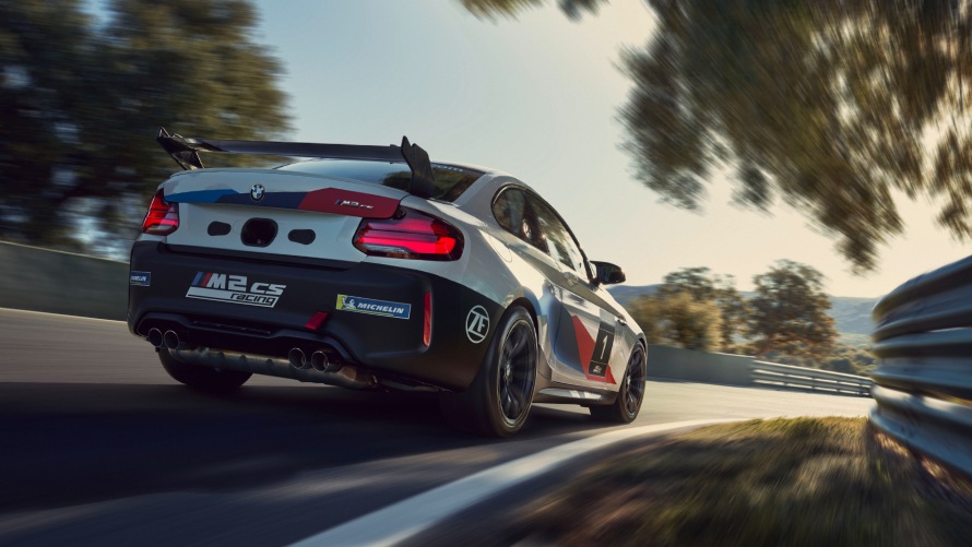 Dynamic three-quarters rear shot of the M2 CS Racing.