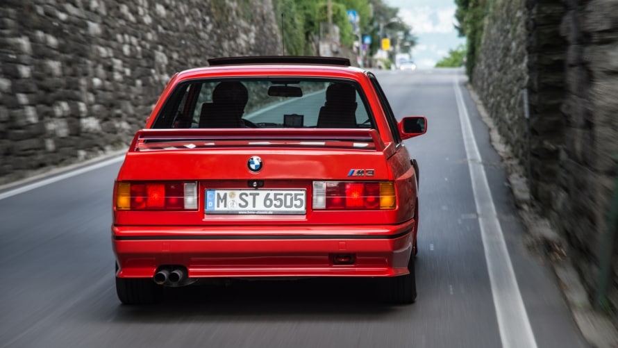 Rear view of a red BMW M3 E30