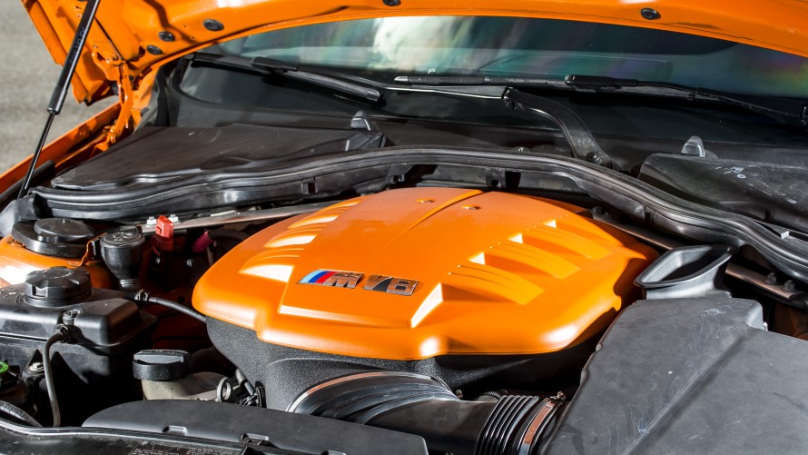 BMW M3 GTS engine compartment with V8 and orange cover