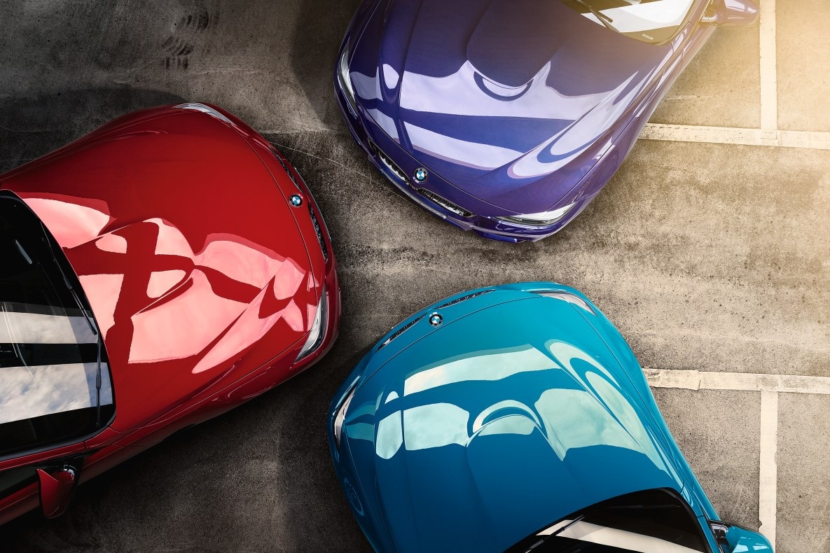 The three availiable paint finishes of the BMW M4 Edition ///M Heritage: Laguna Seca Blue, Velvet Blue and Imola Red II
