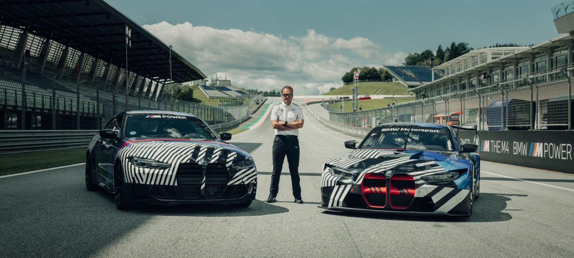 Markus Flasch with the all-new BMW M4 and BMW M4 GT3 Markus Flasch with the all-new BMW M4 and BMW M4 GT3 race car at the Red Bull Ring, Austria