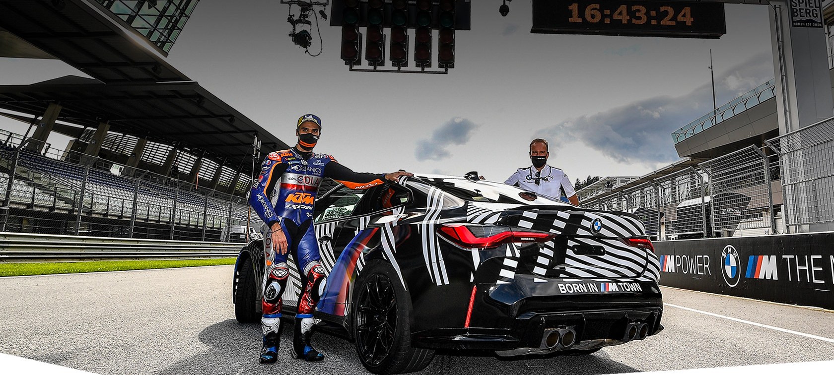 Miguel Oliveira und Markus Flasch mit dem neuen BMW M4 auf dem Red Bull Ring in Österreich