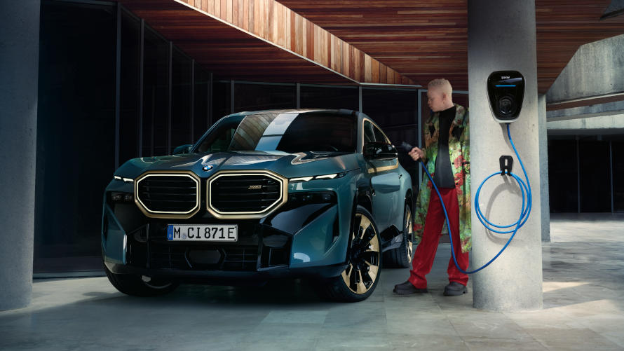 The BMW XM is charged on a wallbox.