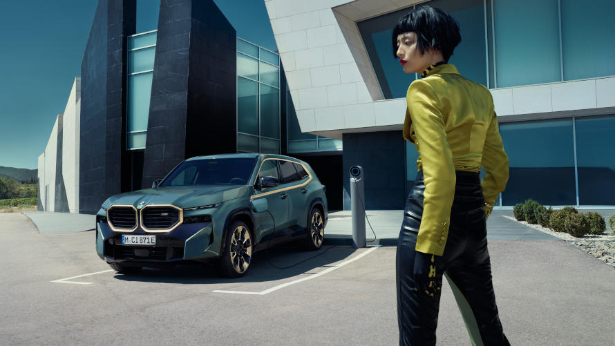 The BMW XM is charged at a charging station.