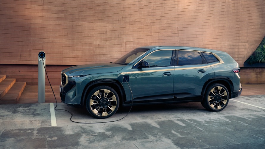 The BMW XM is charged at a charging station.