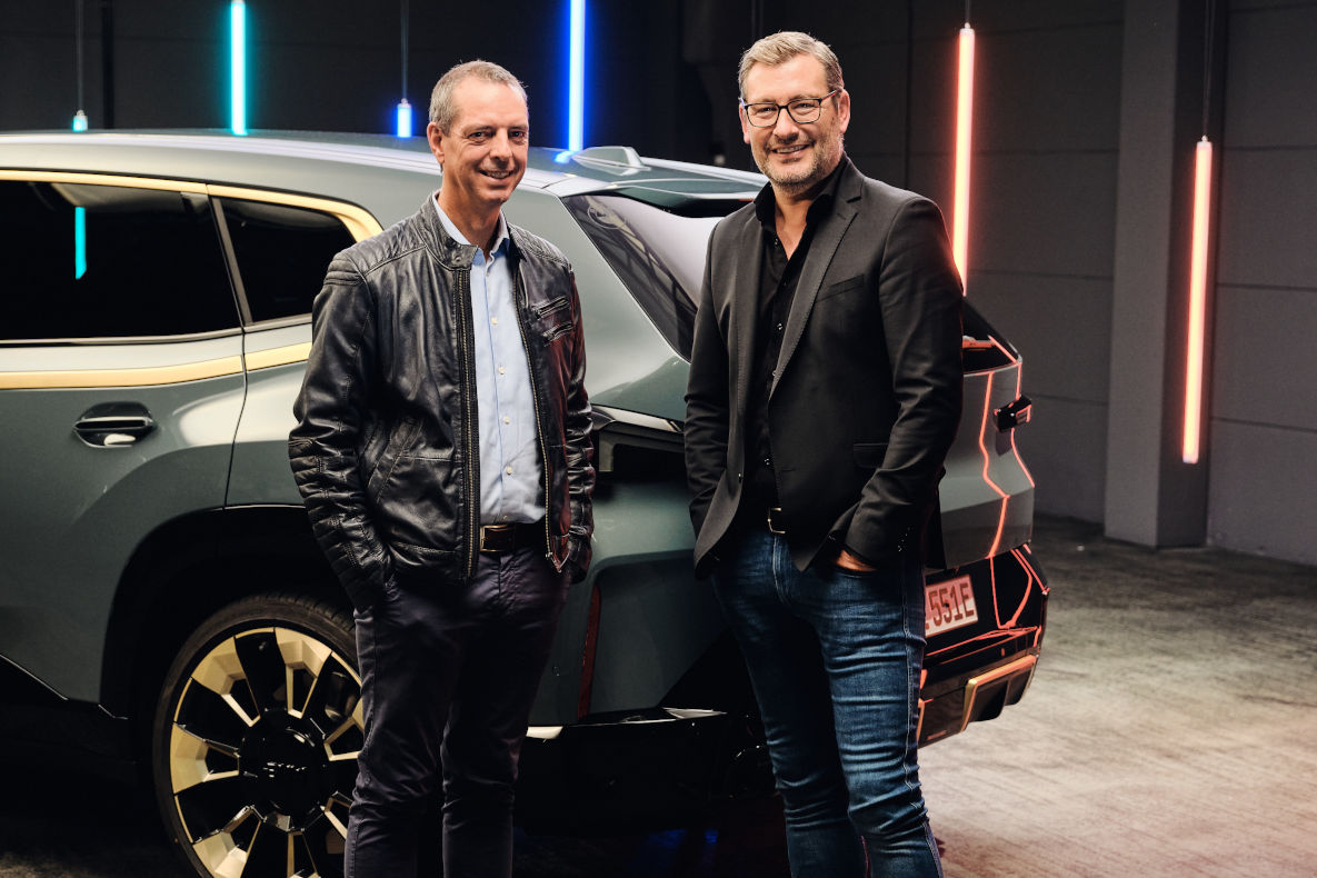 BMW M CEO Franciscus van Meel and Domagoj Dukec, Head of BMW Design, next to the BMW XM