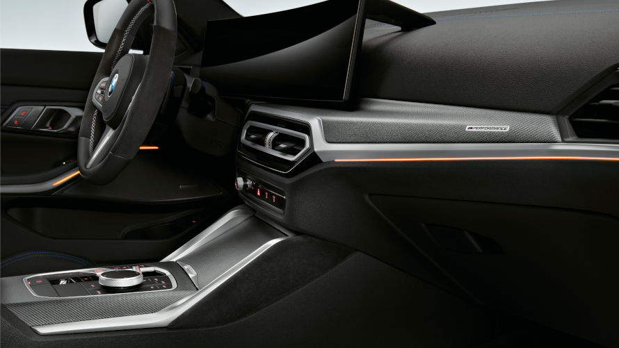 M Performance interior trims in carbon fibre/Alcantara + M Performance kneepads in Alcantara for BMW 3 Series.