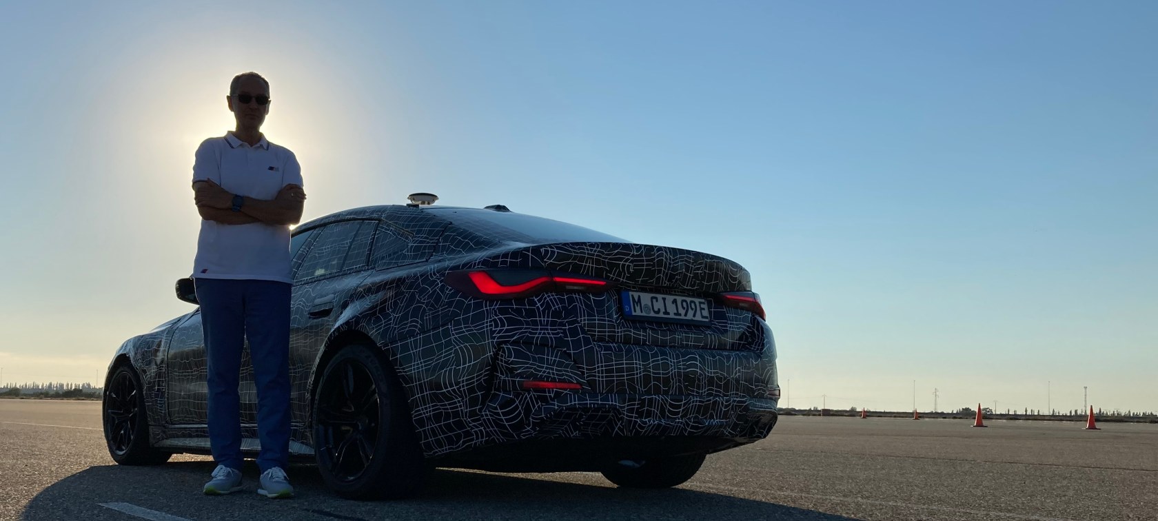 Dirk Häcker, Head of Development at BMW M GmbH next to the all-electric prototype of BMW M