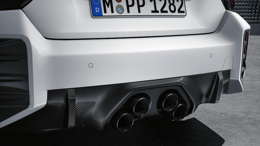 BMW M2 with BMW M Performance Parts: M Performance rear diffuser in carbon fiber, M Performance rear bumper attachment in carbon fiber, M Performance silencer system in titanium and M Performance tail pipe finisher module in titanium.