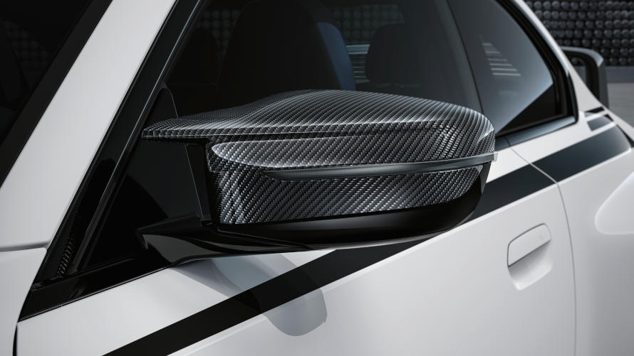 BMW M2 with M exterior mirror cap in carbon fiber, which are part of the BMW M Performance Parts.
