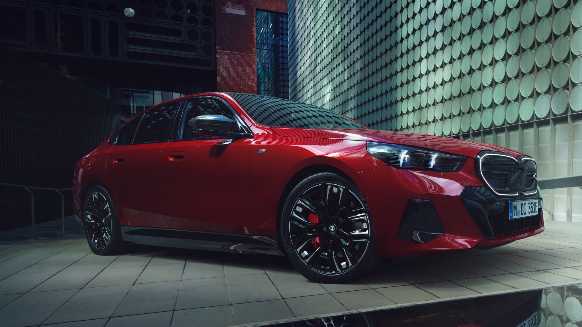  BMW i5 M60 xDrive in modern business park