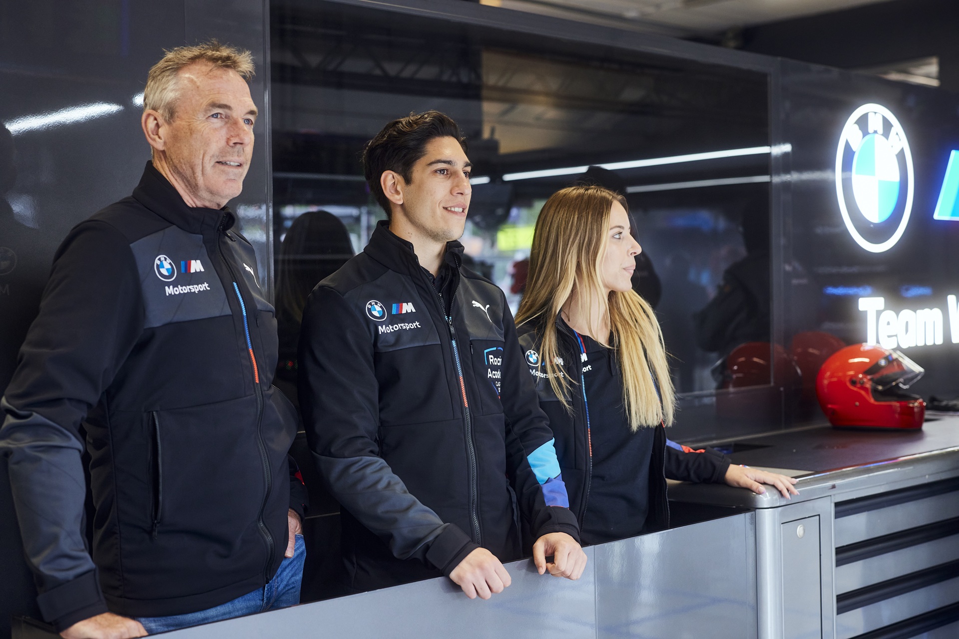 Programme participants Nerea Martí (ESP), driver for BMW Spain in the Iberian Supercars Series, and Berkay Besler (TUR), driver for Turkish racing team Borusan Otomotiv Motorsport, with programme mentor Dirk Adorf (GER) behind the scenes at the FIA World Endurance Championship race in Imola.