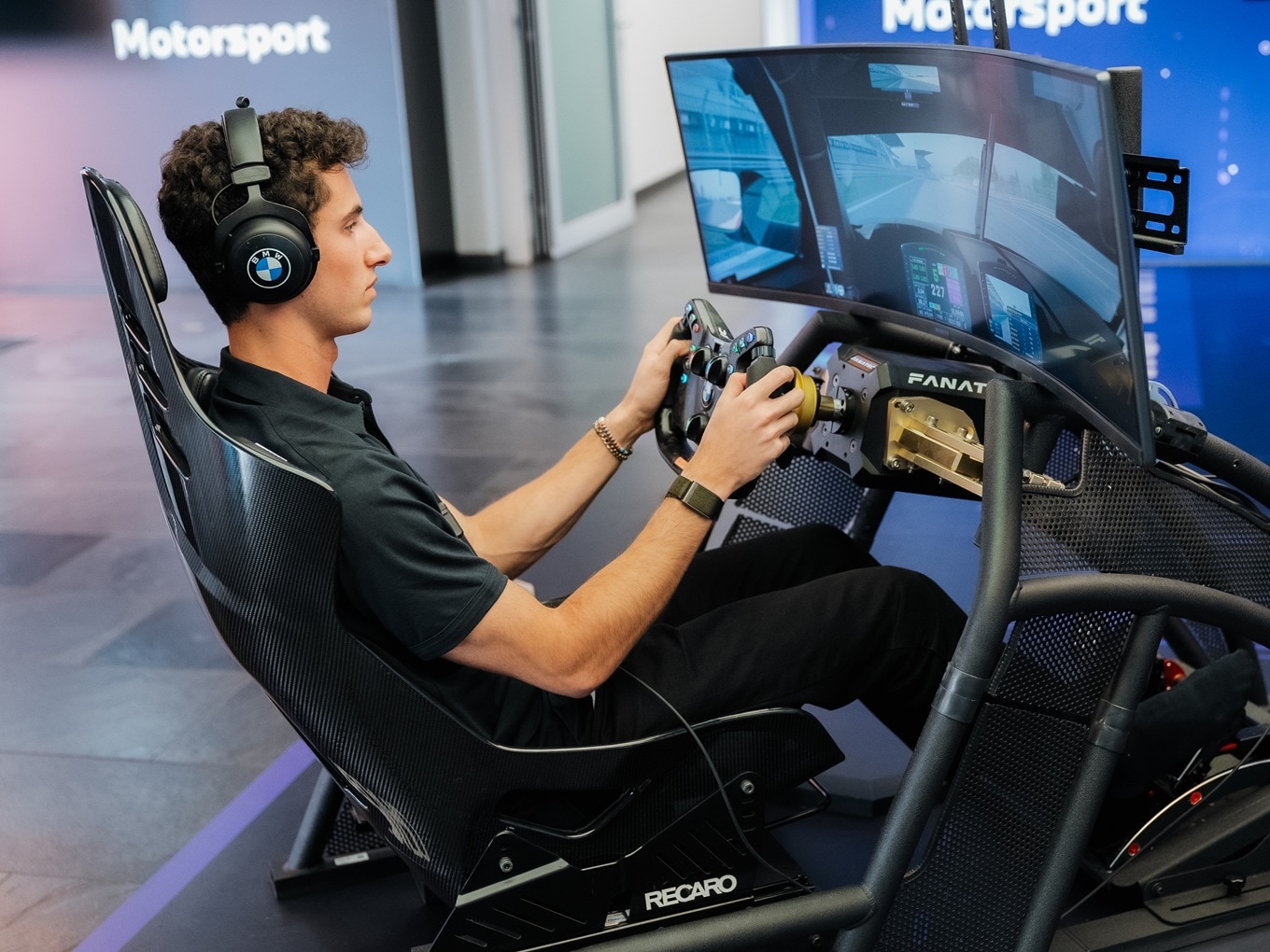 A contestant of the BMW M Racing Academy trains in the simulator.