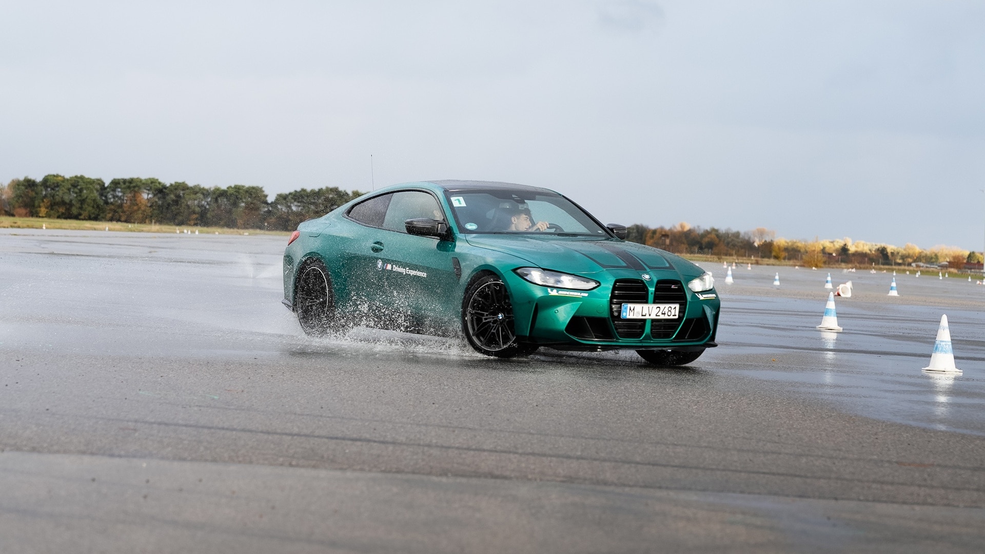 BMW M4 during drivers' tests on wet surfaces at the BMW M Driving Experience-