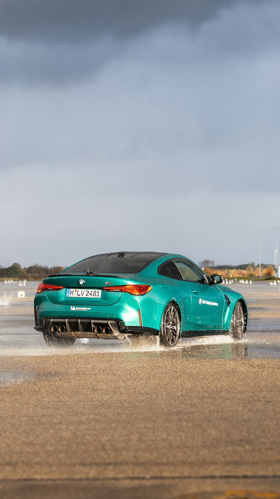 BMW M4 during drivers' tests on wet surfaces at the BMW M Driving Experience-