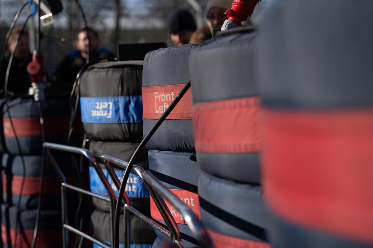 That the tyres warm up faster and retain their temperature better they are warmed in stacks.