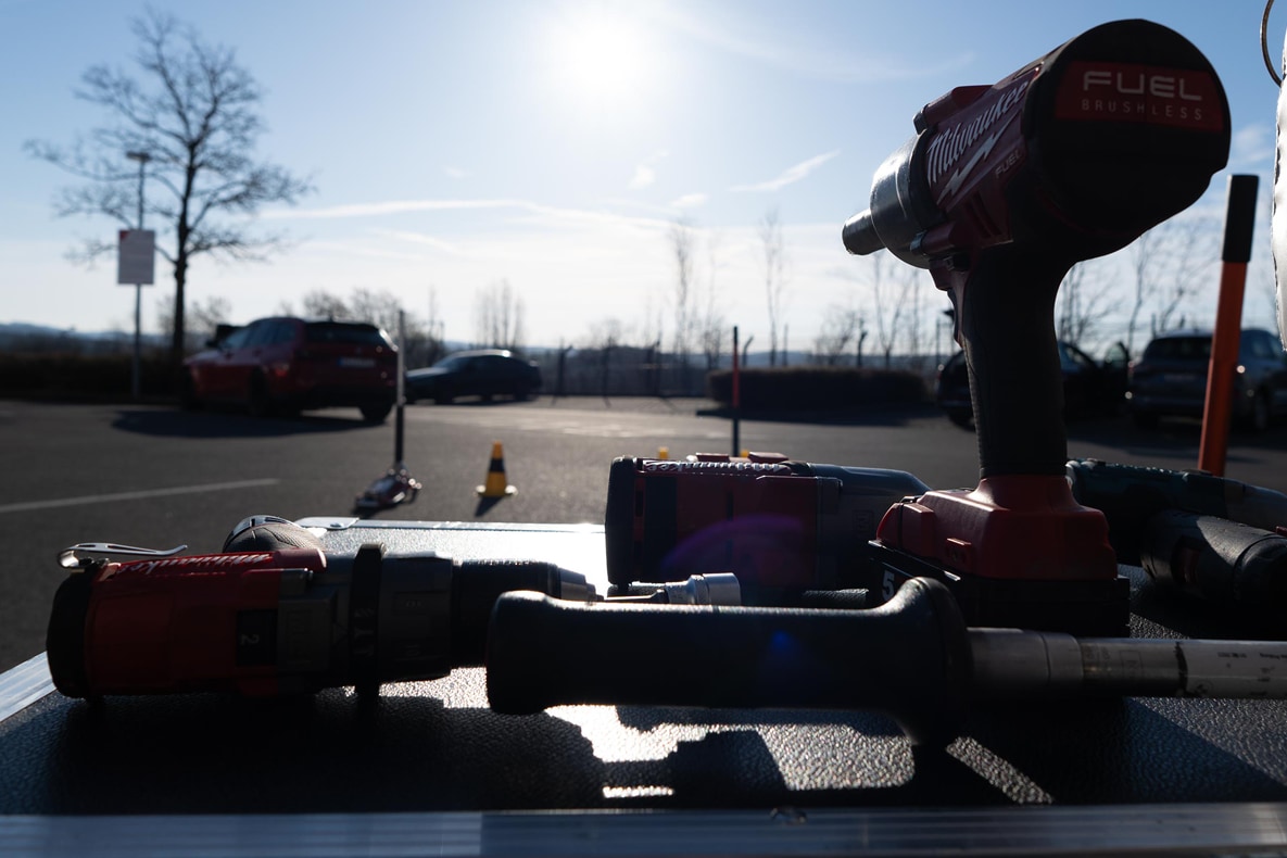Wheel guns and torque wrenches are among the most important tools on record day.