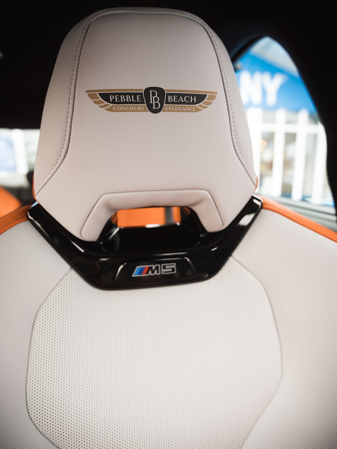 Custom leather coverings with the unique Pebble Beach signet.