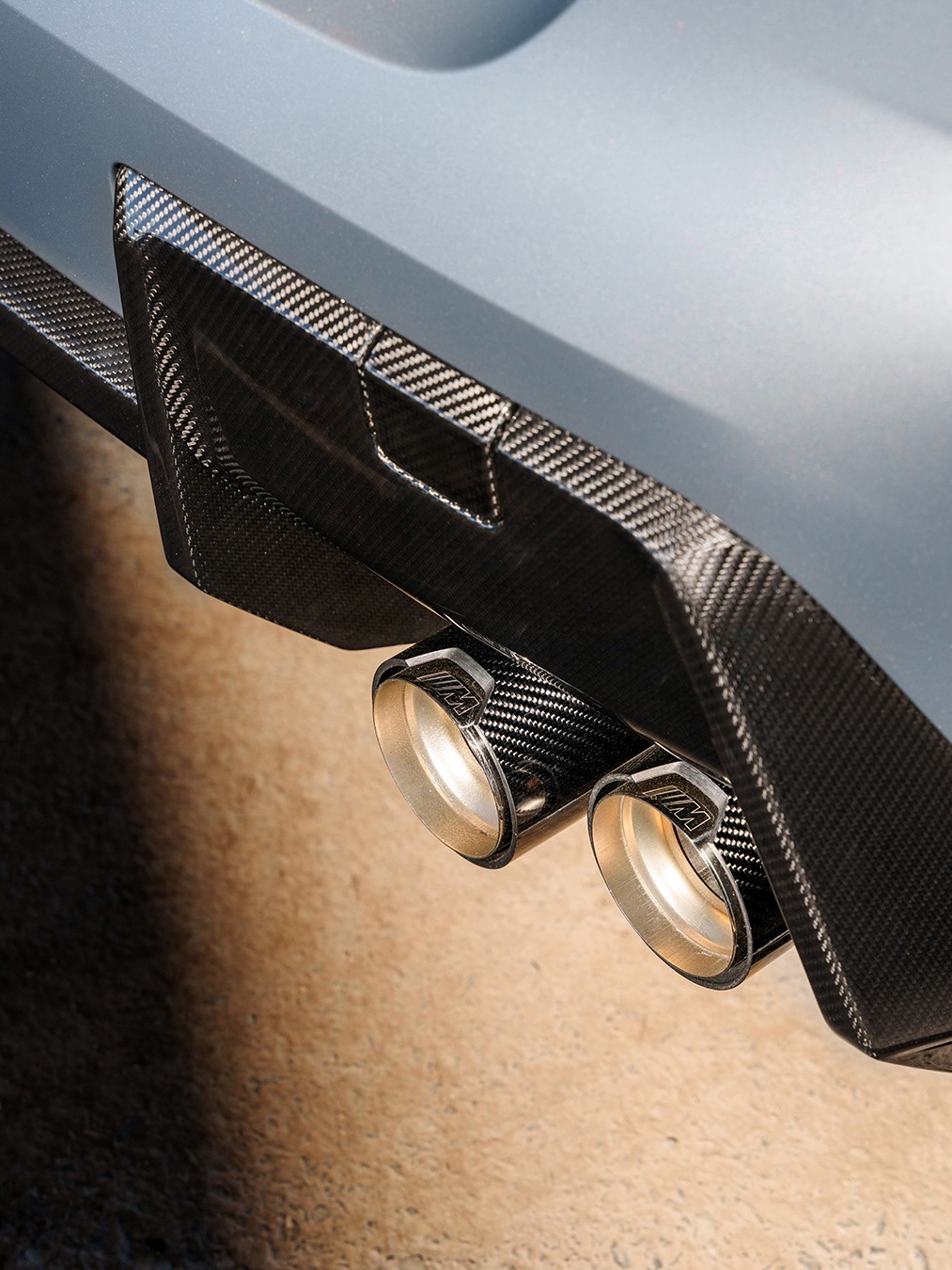 M Performance tailpipe trim Carbon with engraved M Logo