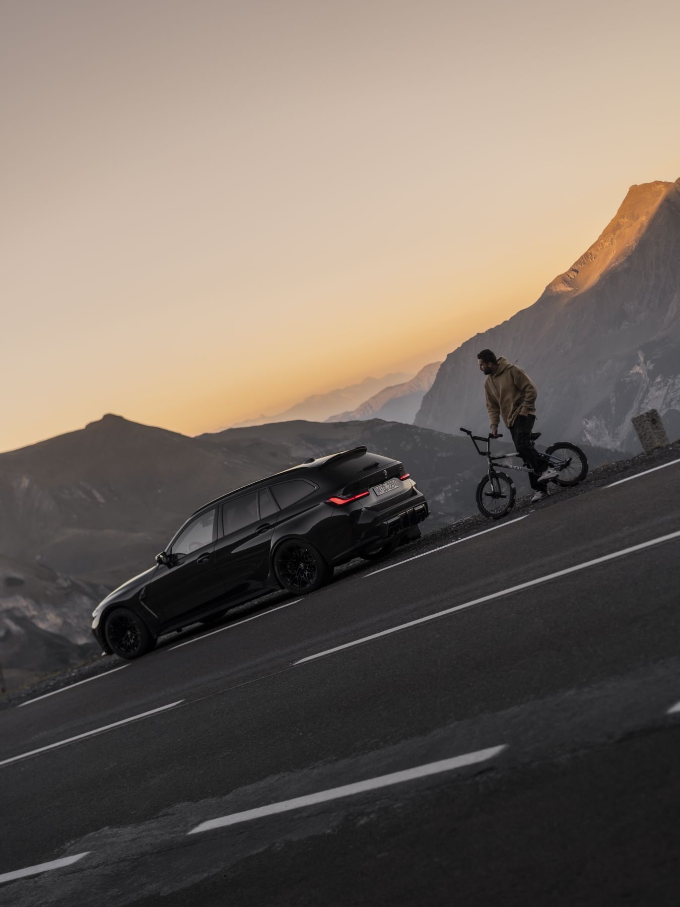 Billy Perry with a BMW M3 Touring in the Alps