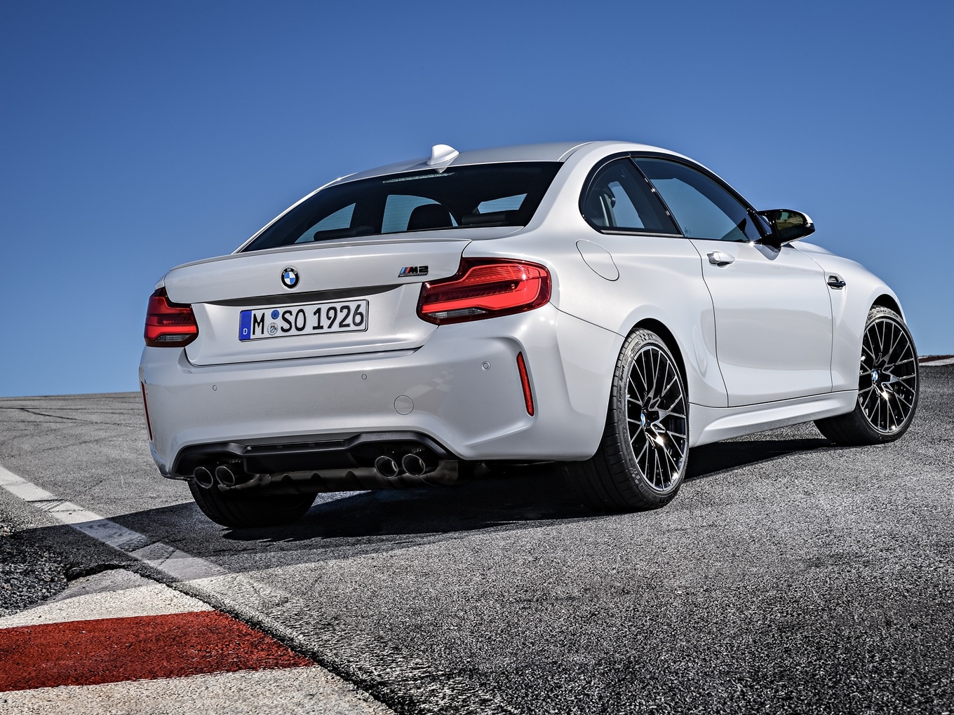  BMW M2 Competition F87 in standstill on a racetrack.
