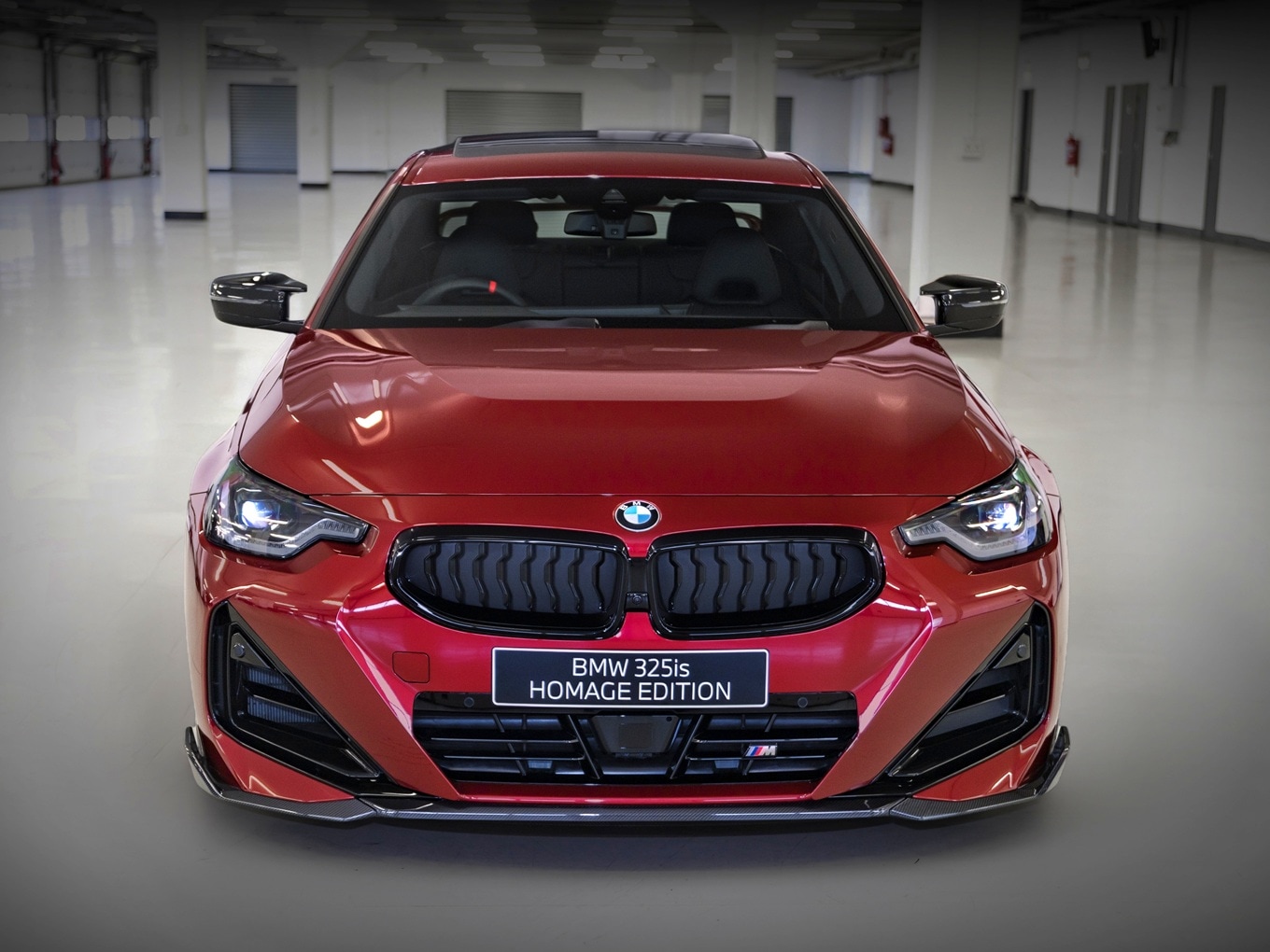 The BMW 325iS Homage in Fire Red metallic. 