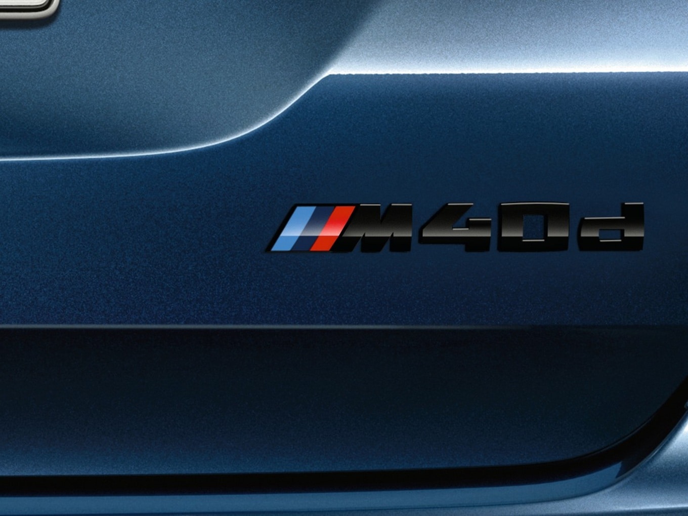 Typenzeichnung des BMW X3 M40d an der Heckklappe.