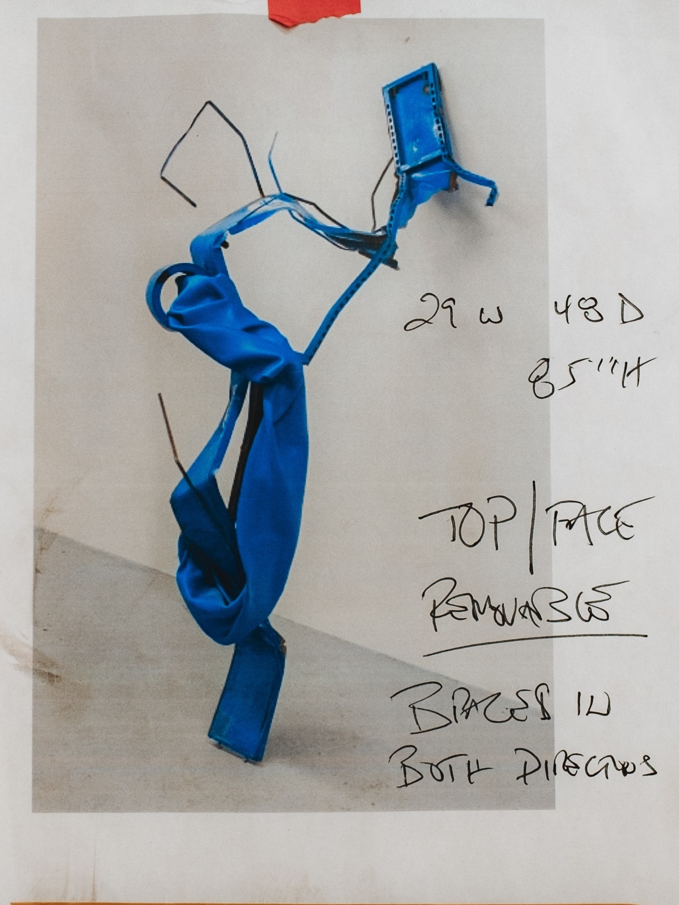 Polaroid of sculpture wiht hand-written notes.