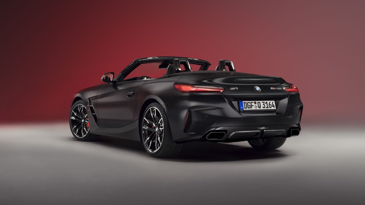 BMW Z4 in motion on sweeping Oklahoma highway — aerodynamic profile at speed