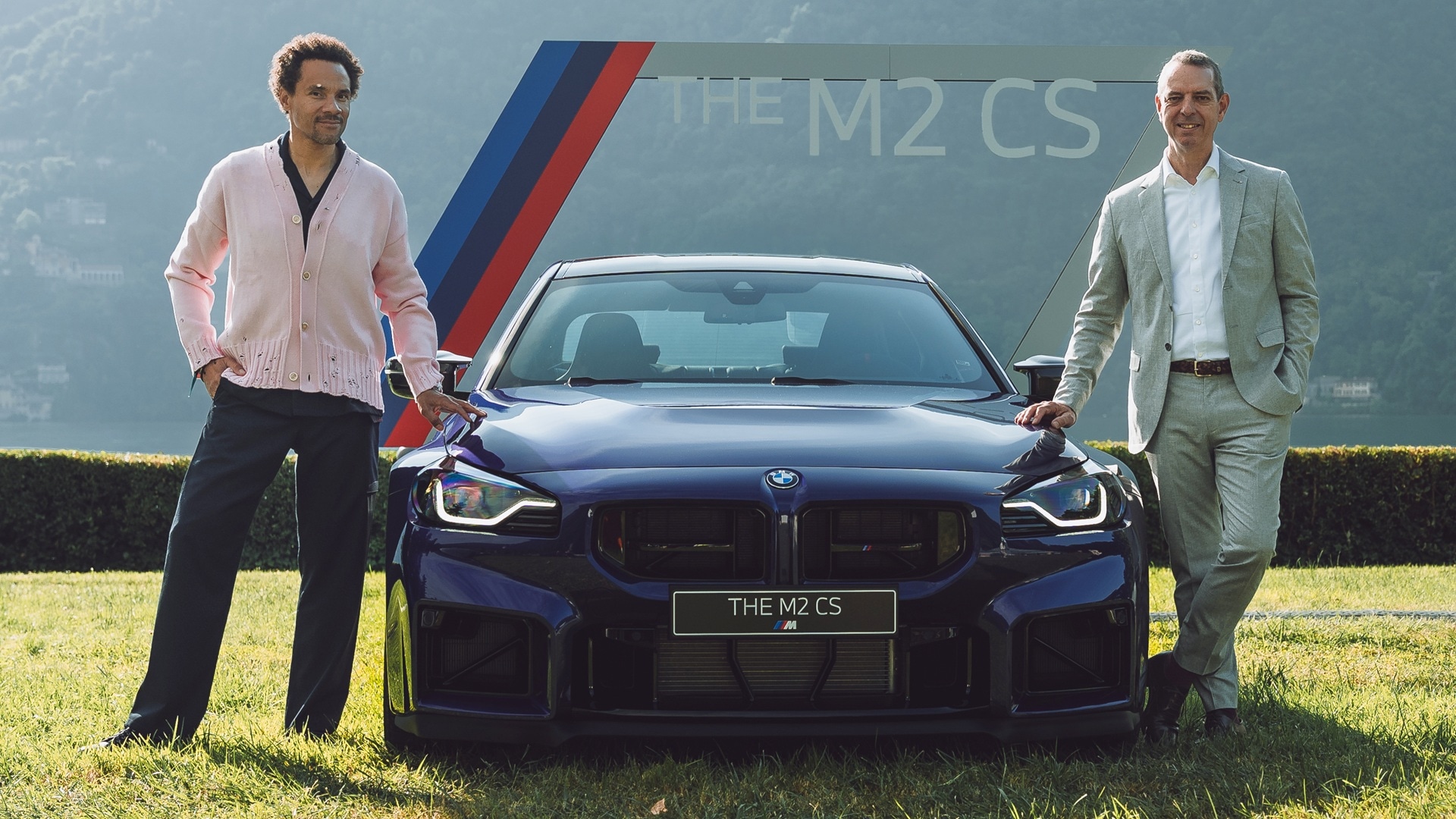 Head of Design BMW compact class, Neue Klasse and BMW M, Oliver Heilmer, and CEO of BMW Mm Franciscus van Meel, with the BMW M2 CS at Lake Como.