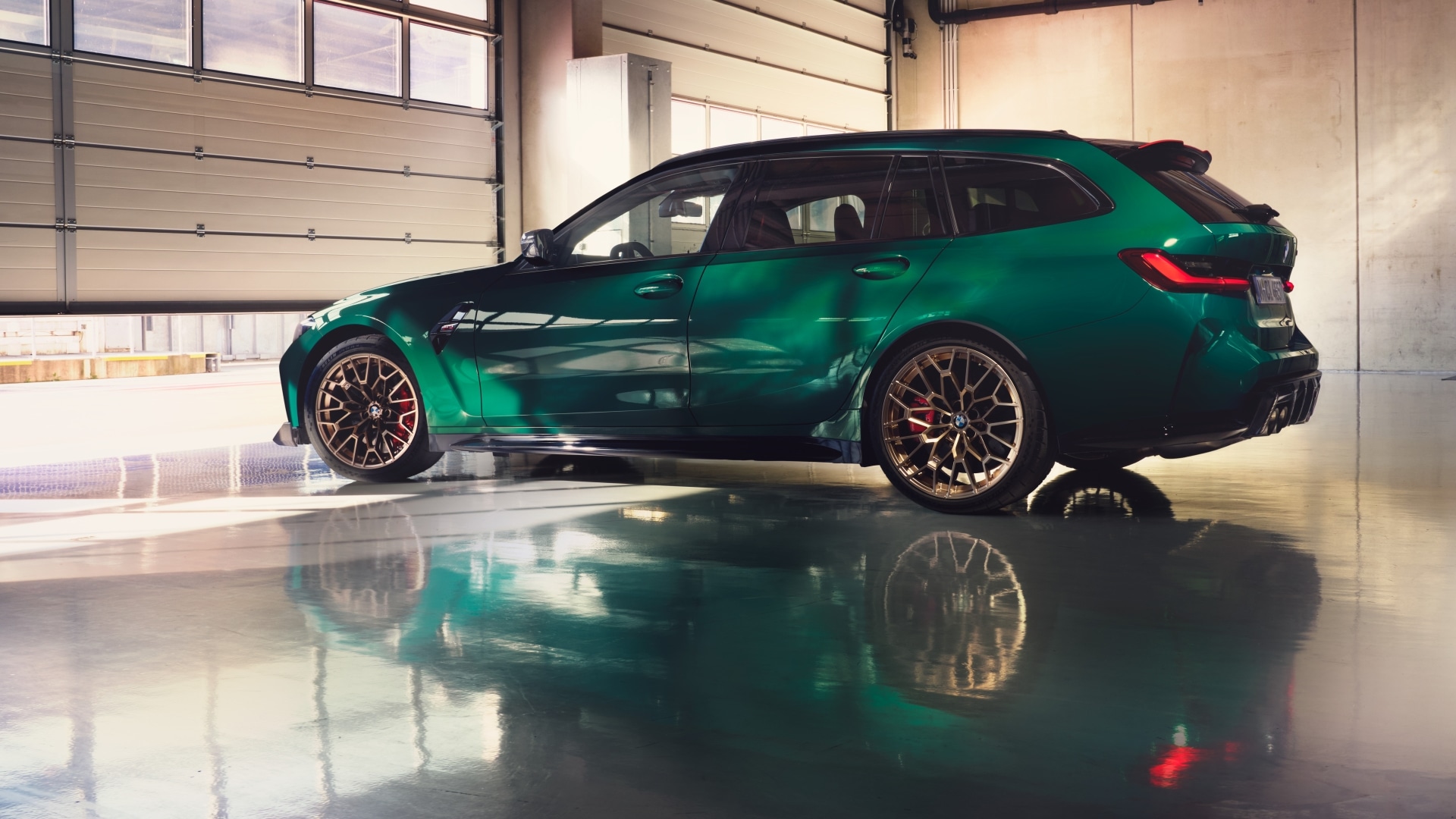 BMW M3 CS Touring in a garage.