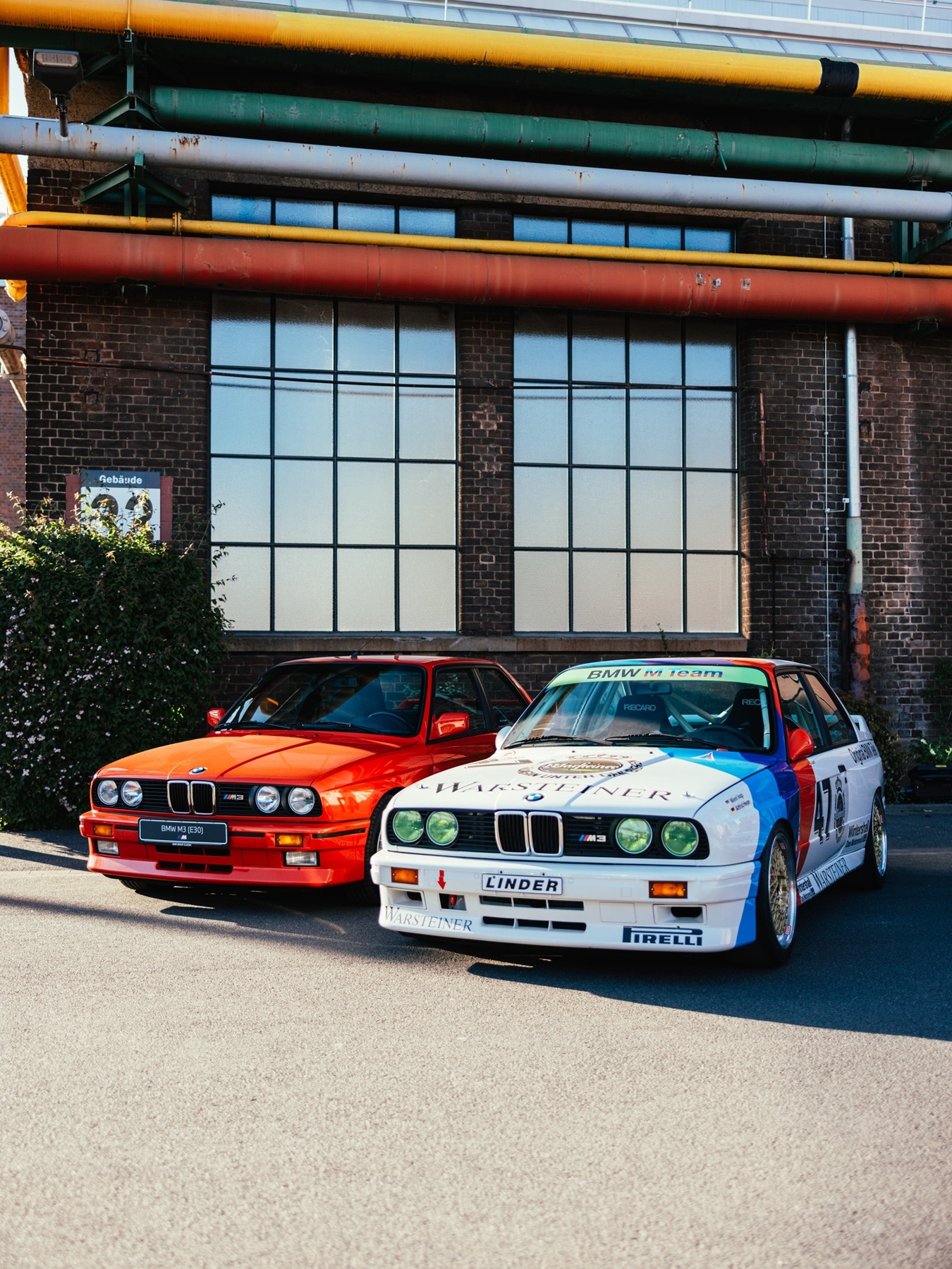 A road-legal and a racecar version of the BMW M3 E30.