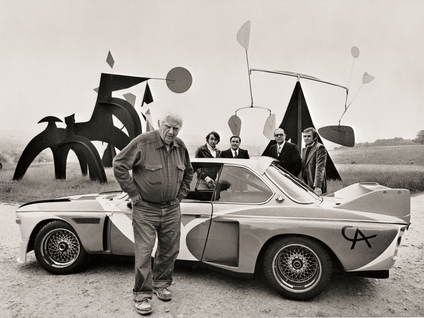 The artist Alexander Calder with his creation, the first BMW Art Car from 1975, based on the BMW 3.0 CSL.