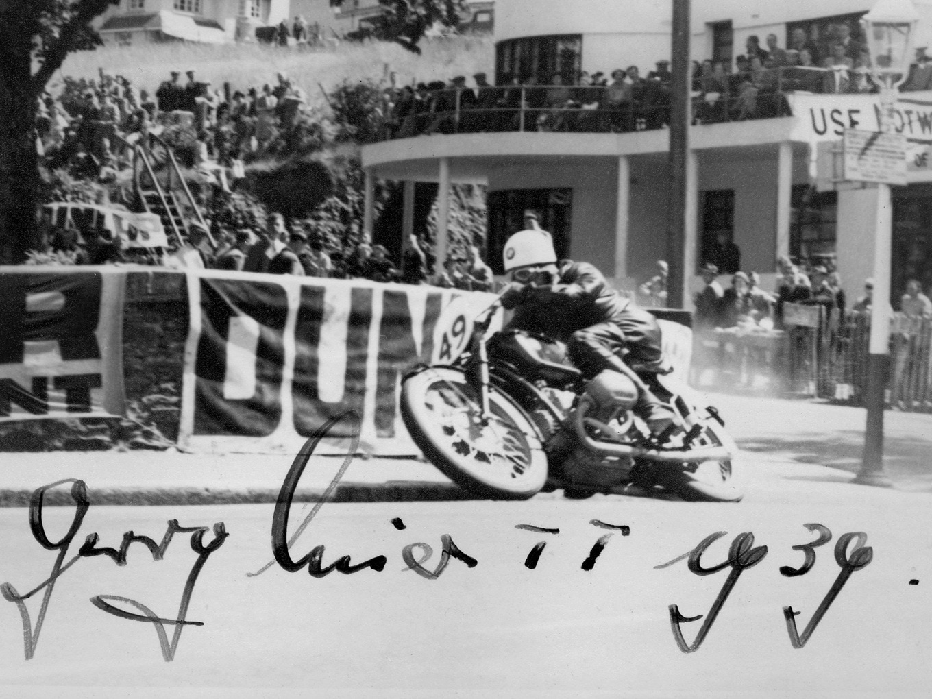 A photograph signed by title-winning rider Georg Meier, showing him at the 1939 Senior TT.