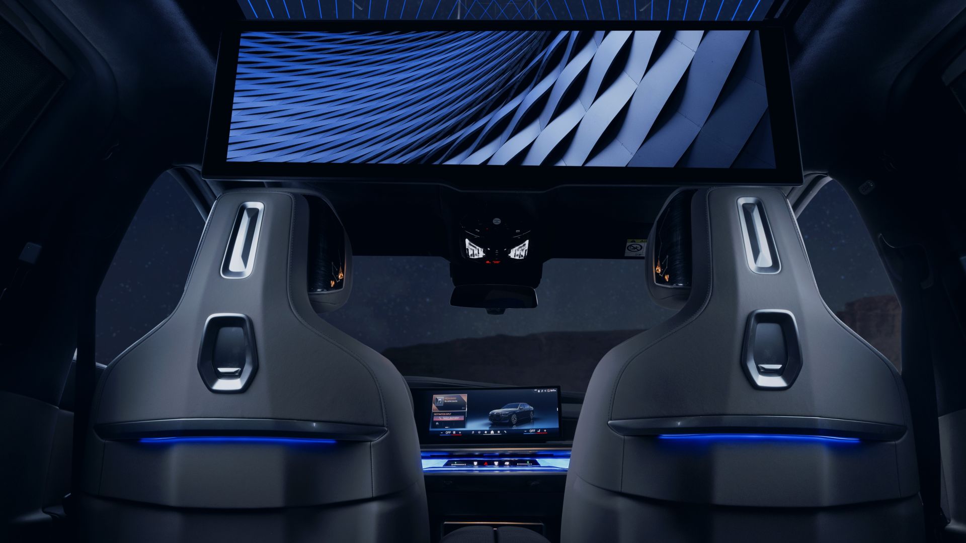 Spacious rear seats area - named Executive Liounge - of the BMW 7 Series Suhail Edition with a 31,3-Inch-8K-Theatre-Screen.