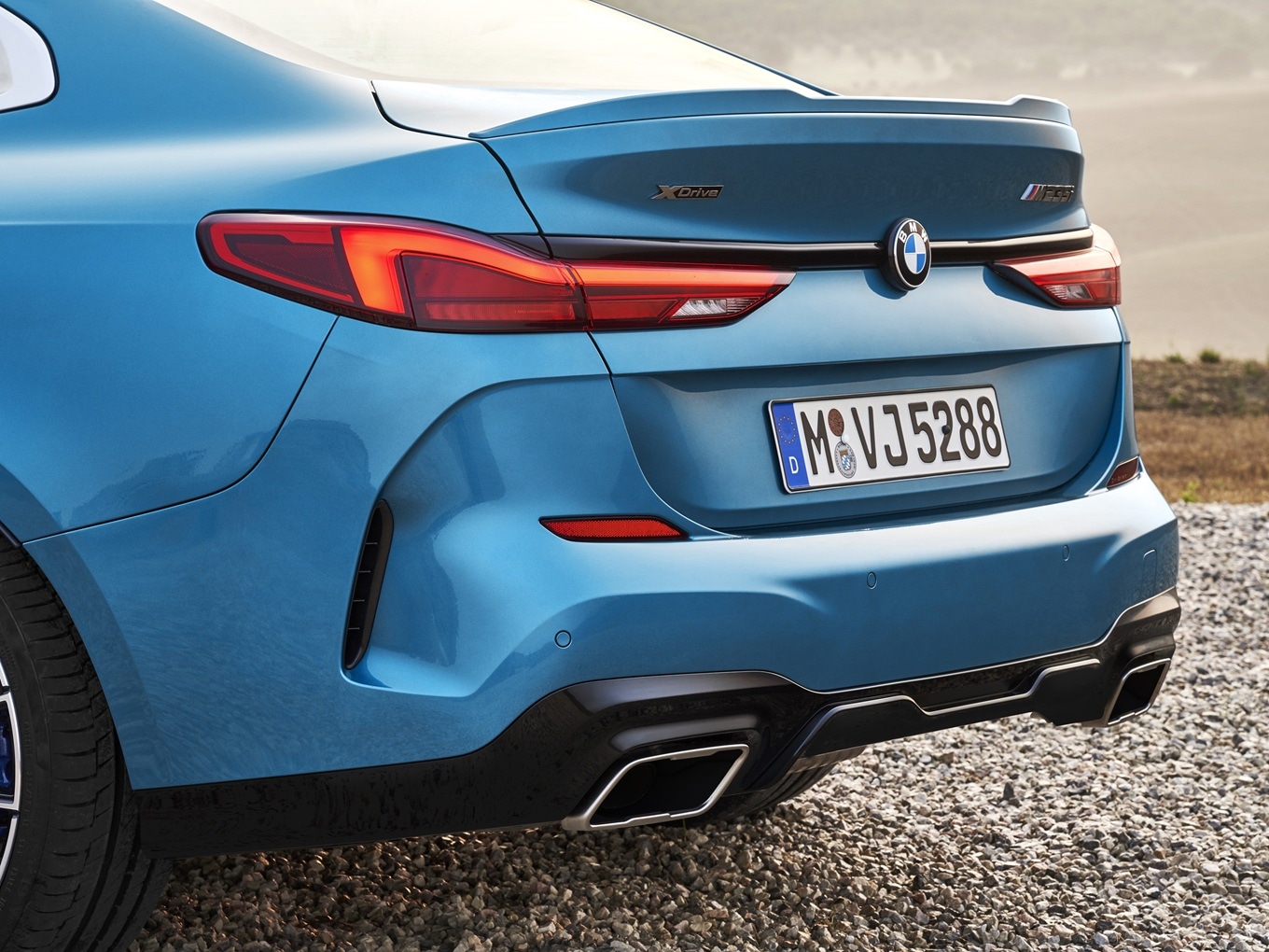 Rear view of the BMW M235i xDrive Gran Coupé F44 with slender LED rear lights in “L” shape. 