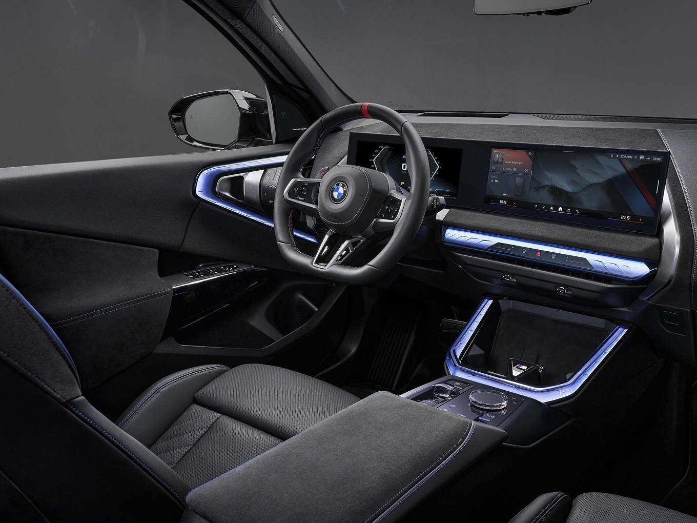 Alcantara trim around the driver’s instrument panel and the central display.