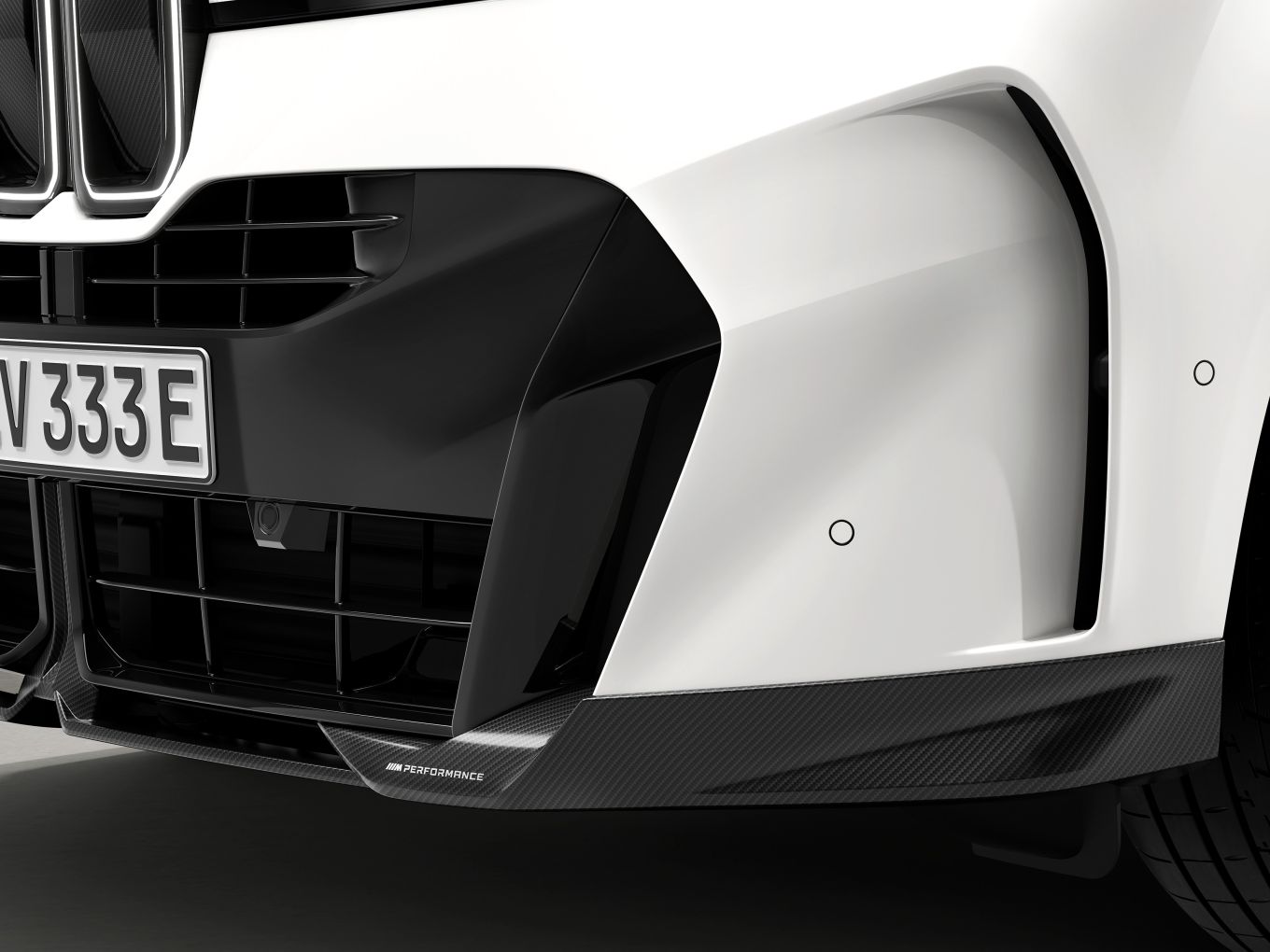 Seitenteil des M Performance Frontsplitters Carbon.
