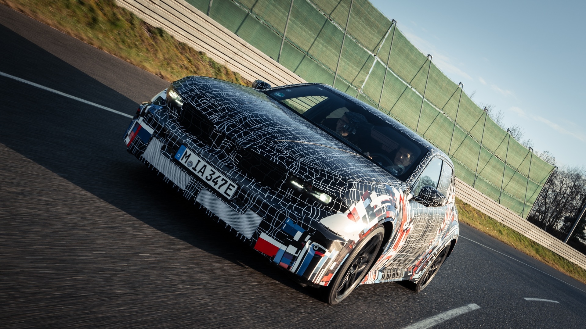BMW M fully electric drivetrain test vehicle. on a test track