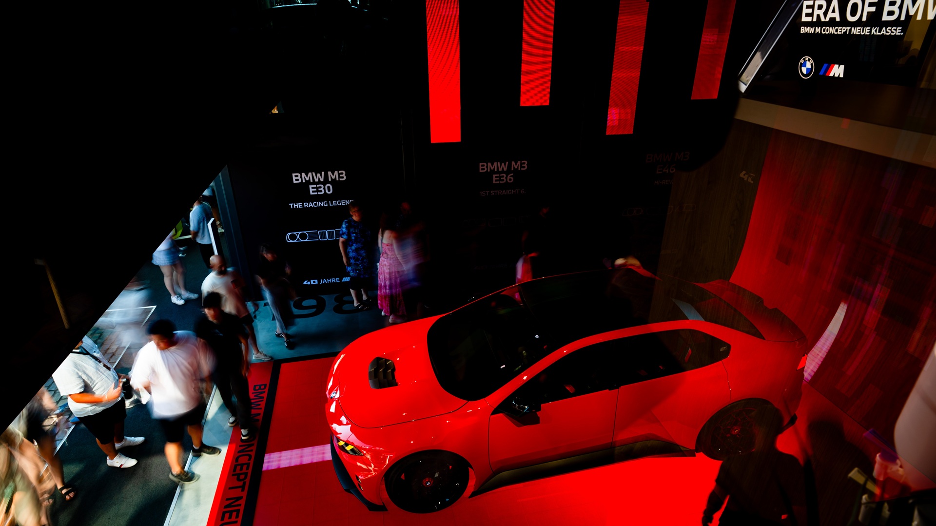 Visitors flock at the stand of the BMW M Concept Neue Klasse. 