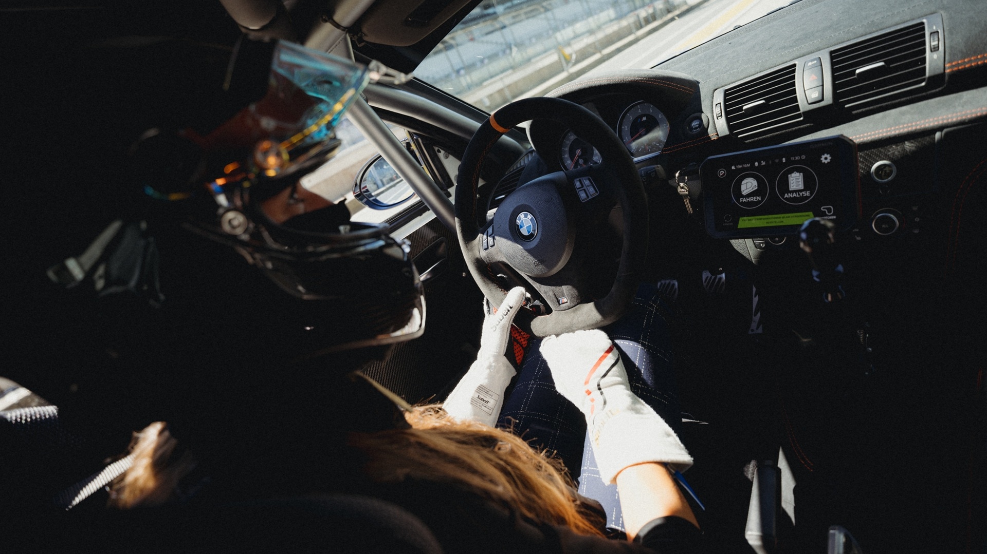 Driver during a driver's training in the Cockpit of a BMW M4. 