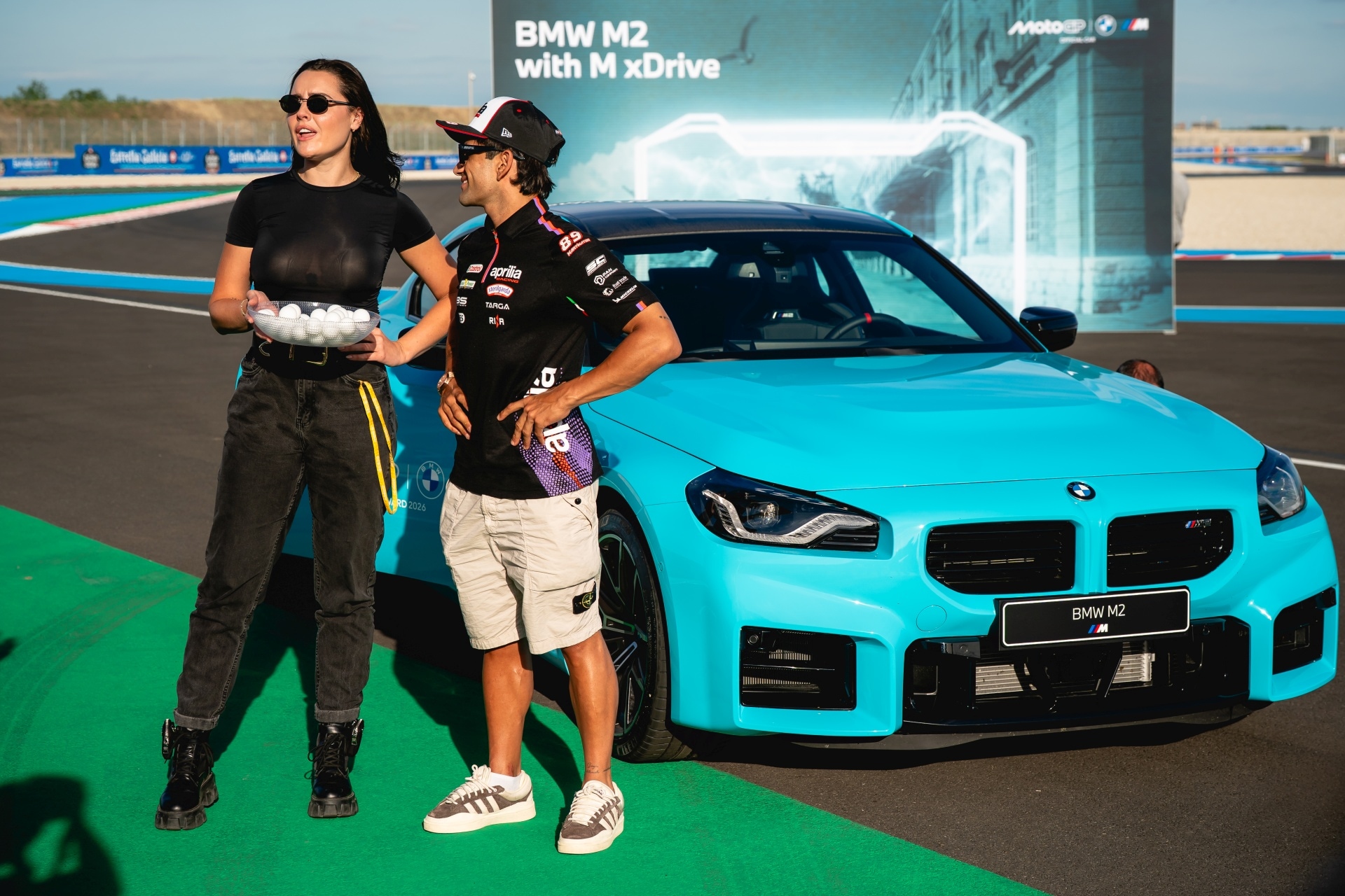Becky Evans and Jorge Martín with the new BMW M2 mit M xDrive