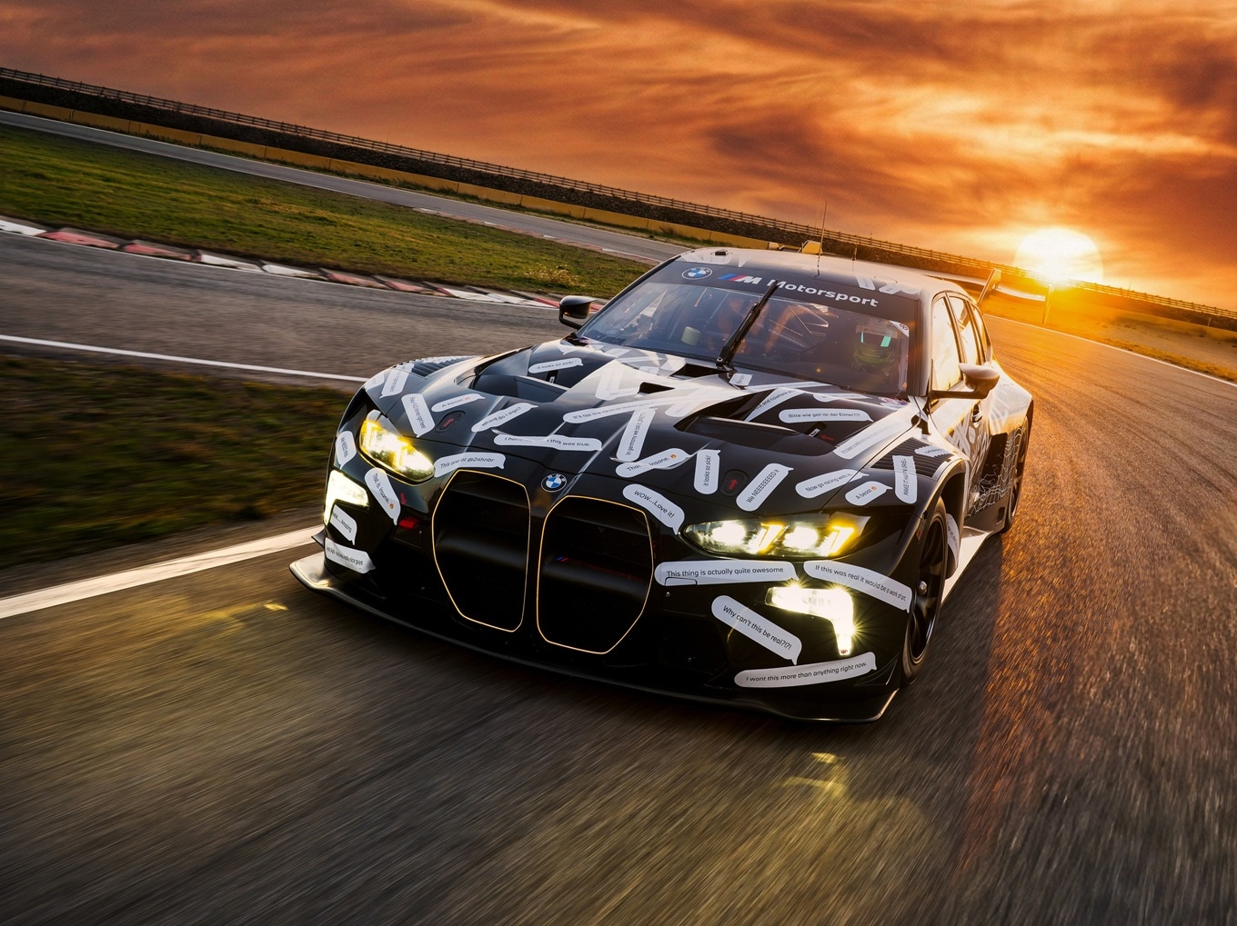 The BMW M3 Touring 24H driving on a racetrack.